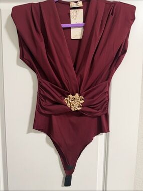 Draped Burgundy V-Neck Bodysuit with Gold Floral Accent